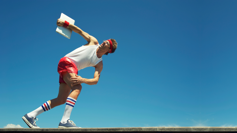 Man running with a laptop